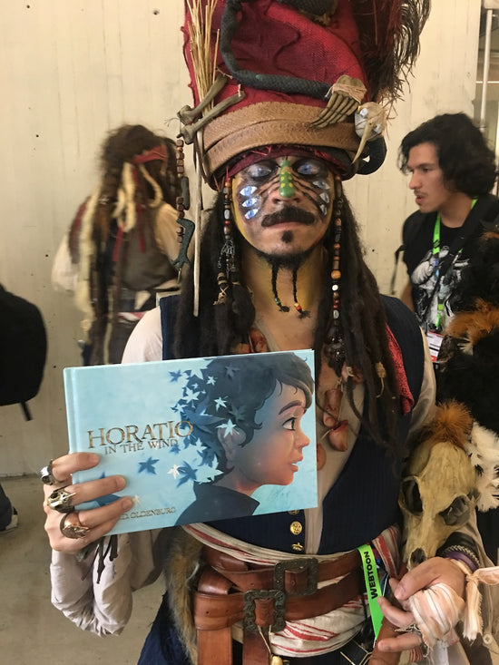 Jack sparrow holds horatio in the wind